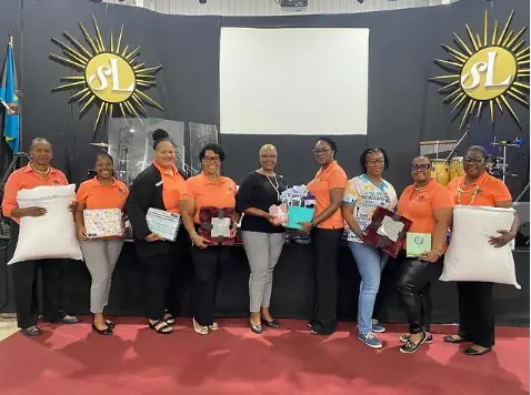 Women in Bahamas receive personal care and hygiene packages donated by Teachers union