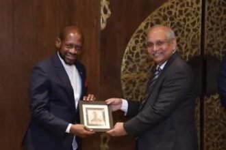 Dr. Denzil Douglas discusses bilateral cooperation with CII Director General in India