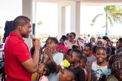 Prime Minister Terrance Drew interacting with students at the Annual Back to School Fair in Saint Kitts and Nevis.