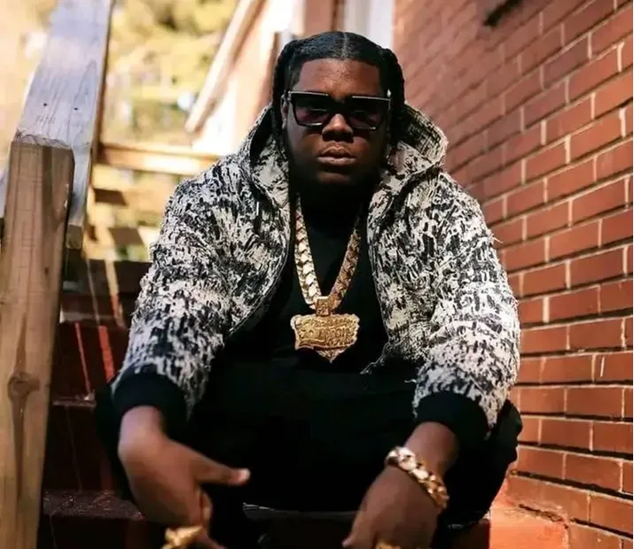 Byron Messia, a St Kitts and Nevis artist, holding his two awards from the Caribbean Music Awards 2024.