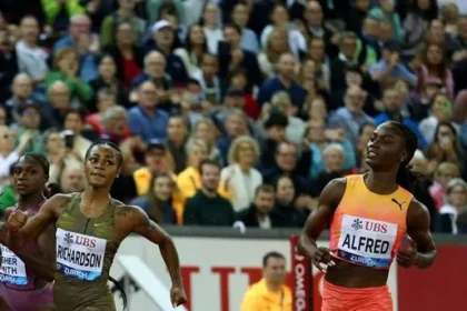 Julien Alfred celebrating her silver medal win at the Diamond League in Zurich.