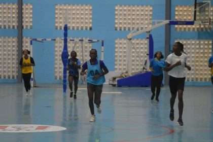 Saint Lucia netball squad posing together ahead of the ECCB International Netball Series.