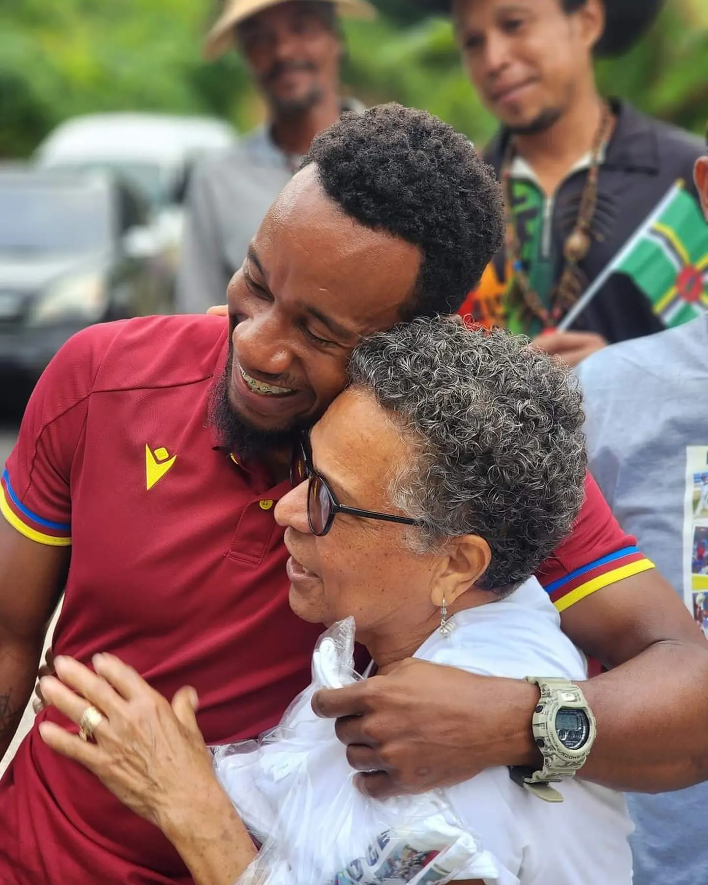 Kavem Hodge being celebrated in a motorcade after scoring his first Test century.