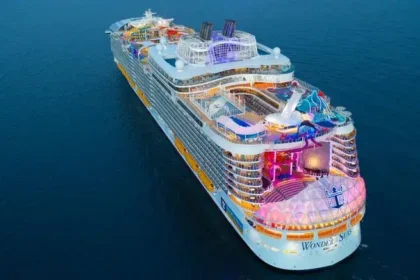 Wonders of Seas cruise ship docked in Grenada, showcasing its impressive size and amenities.