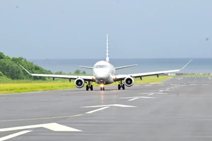 Ministers inspecting the runway extension project at Douglas Charles Airport in Dominica.