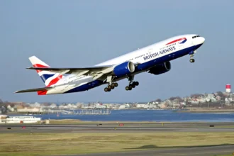 British Airways Boeing 777-200 departing St. Kitts and Nevis for Antigua.
