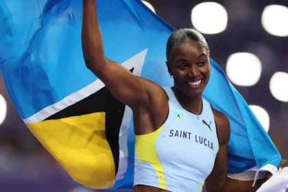 Julien Alfred celebrating her victory at the Brussels Diamond League.