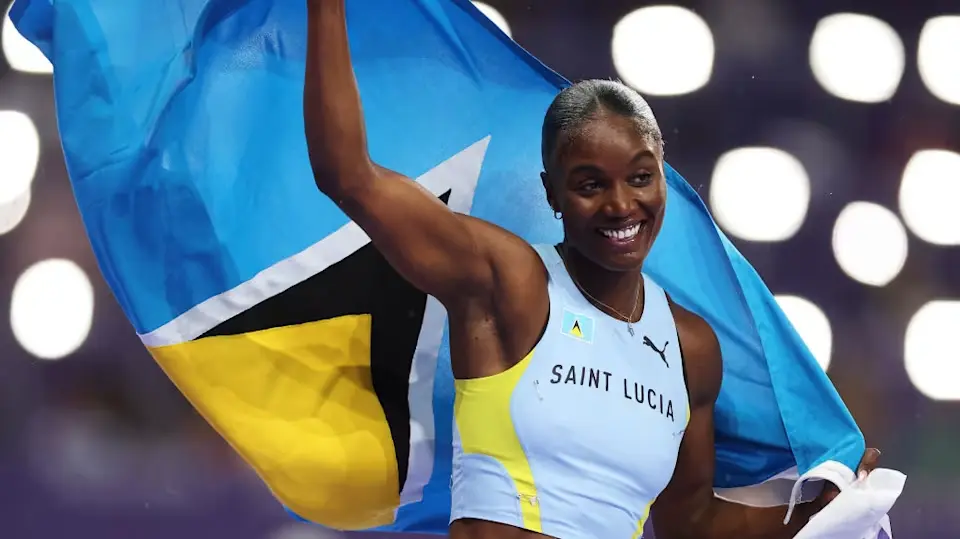 Julien Alfred celebrating her victory at the Brussels Diamond League.