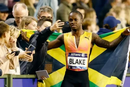 Akeem Blake celebrating his victory in the men's 100m race at the Diamond League.