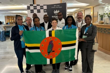 Dominica's women's chess team celebrating their victory against Laos in Round 7 of the Chess Olympiad.