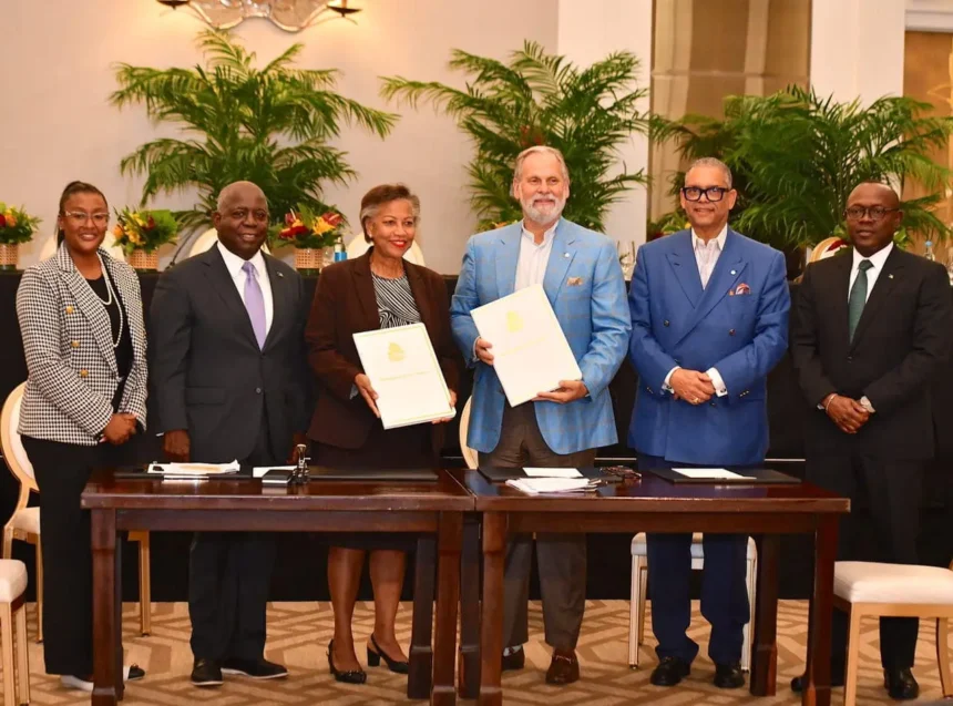 Prime Minister Philip Davis and investors signing the $350 million agreement for the Bahamas.