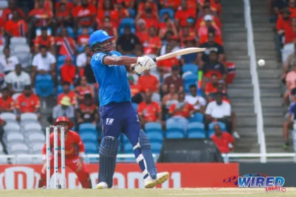 Johnson Charles celebrates after scoring 89 runs for St. Lucia Kings against Trinbago Knight Riders.
