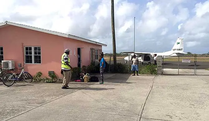 J8-VBK SVG aircraft lands at Codrington Airport as the final flight before its closure.