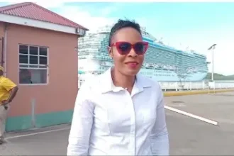 Antigua: Female Tour Bus Driver Makes Inroads in Male-Dominated Industry